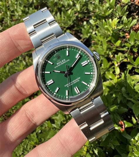 rolex oyster perpetual ref. 126000 - green dial|rolex oyster perpetual green price.